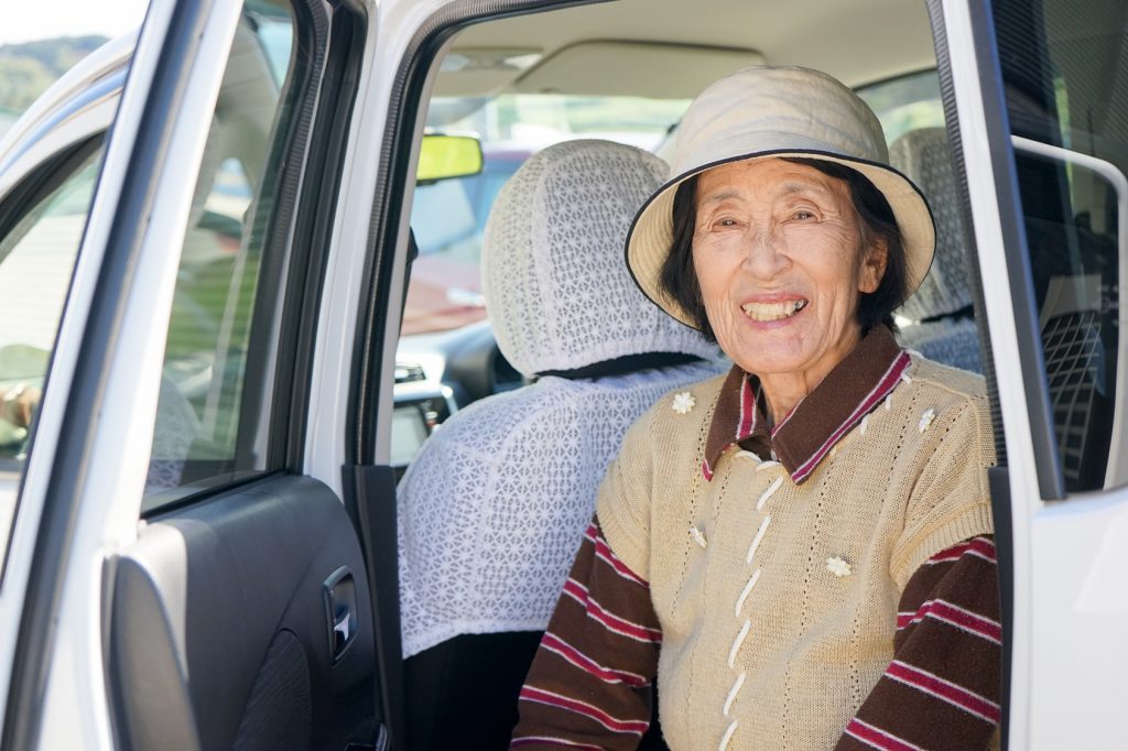 Senior woman walking outside